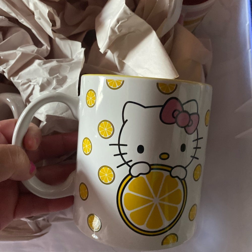 Hello Kitty Mugs, one of each mug.  Each mug $18